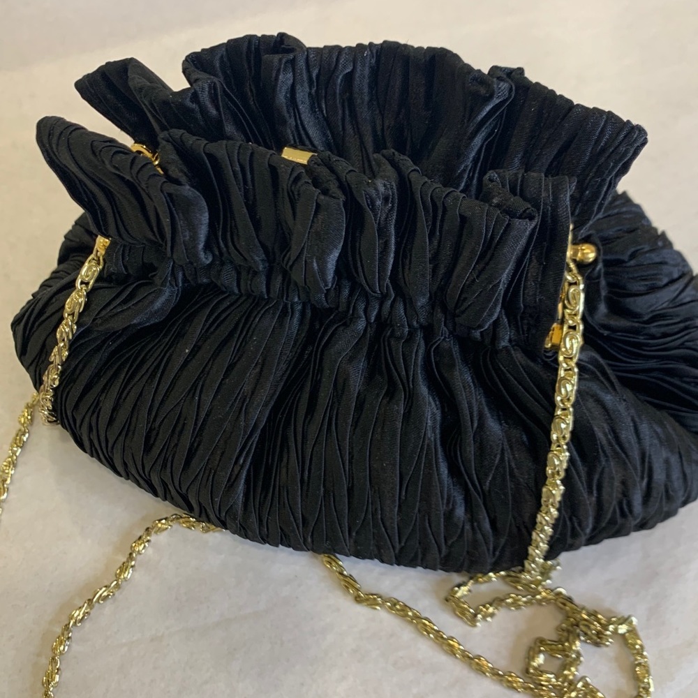 Evening wear black ouch purse with gold chain